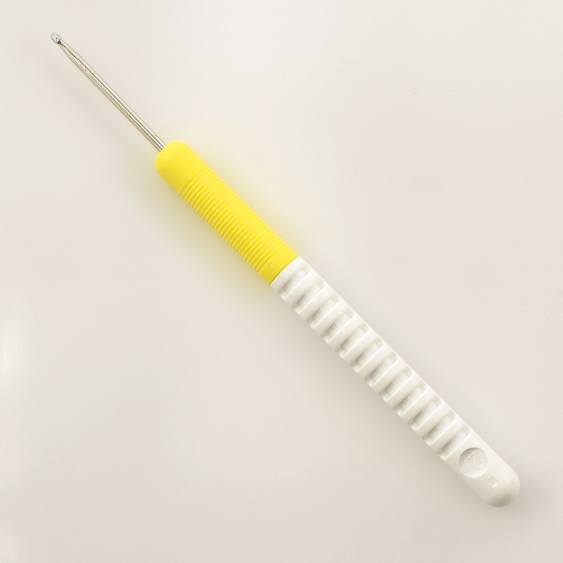 Крючок вязальный d 2,5 длина 15см цв. белый, желтый с пластиковой ручкой  Addi 148-7/2.5-15														